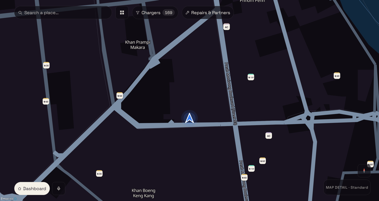 Full map mode at night in English: Phnom Penh, charger pins and the position puck.